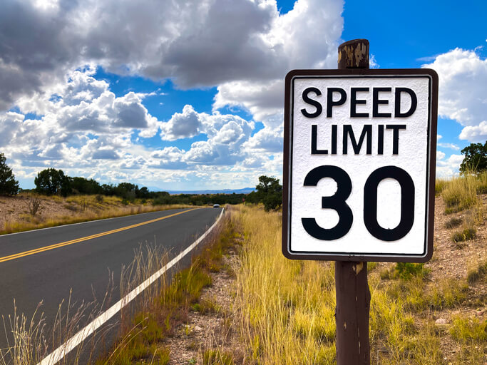A speed limit sign along a highway in New Mexico.